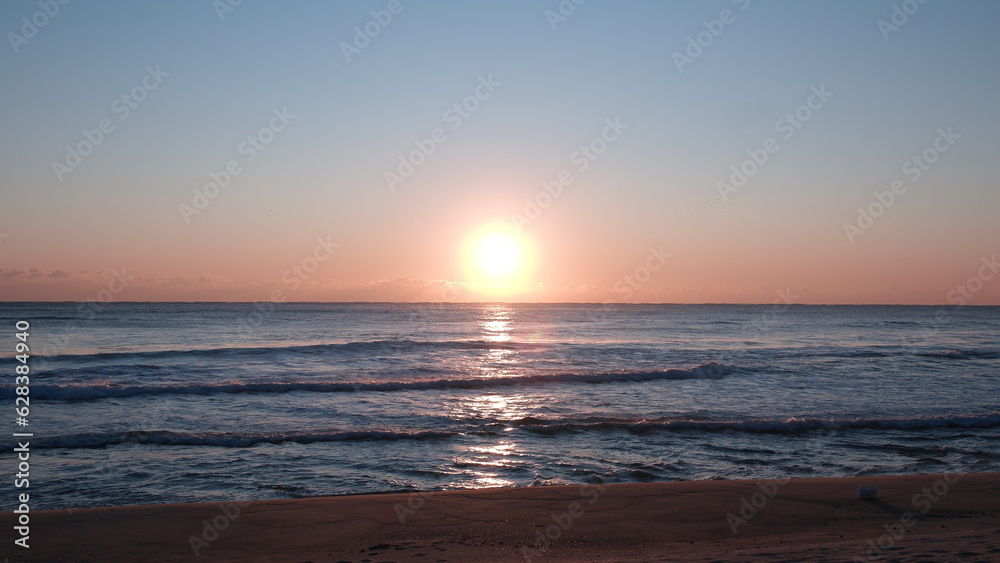 Naklejka premium sunrise on the beach