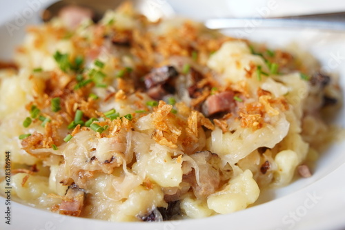 Photography A traditional Czech dish, potato gnocchi , bacon, bacon fat and fried onions, ca