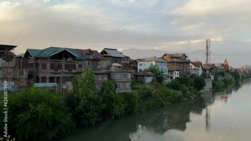 Houses Water fresh in river Jhelum in Srinagar downtown area an old city. Houses Water fresh in river Jhelum in Srinagar downtown area an old city.