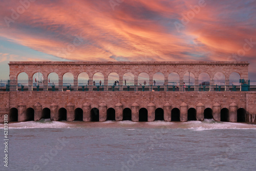 Stone bridge of Beysehir, regulator dam and pedestrian bridge over canal close to Lake Beysehir. Konya Province, Turkey.