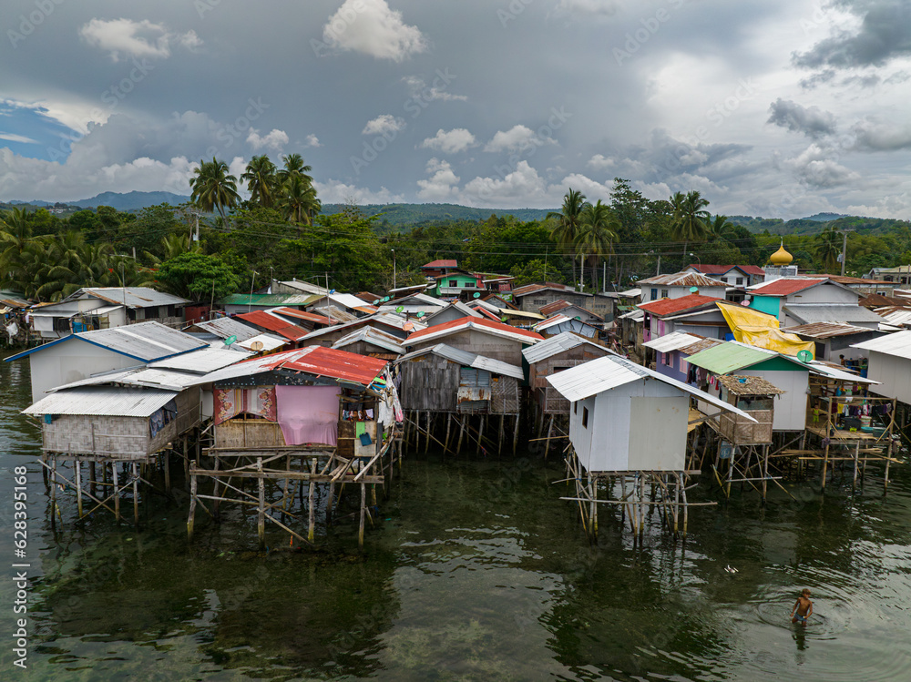 Squatter Stilt Houses of fishermen over the sea in Zamboanga del Sur. Mindanao, Philippines.