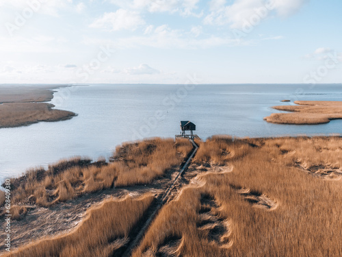 Aerial photo of Kiekkaaste Bird Observatory in The Netherlands at Wadden Sea photo