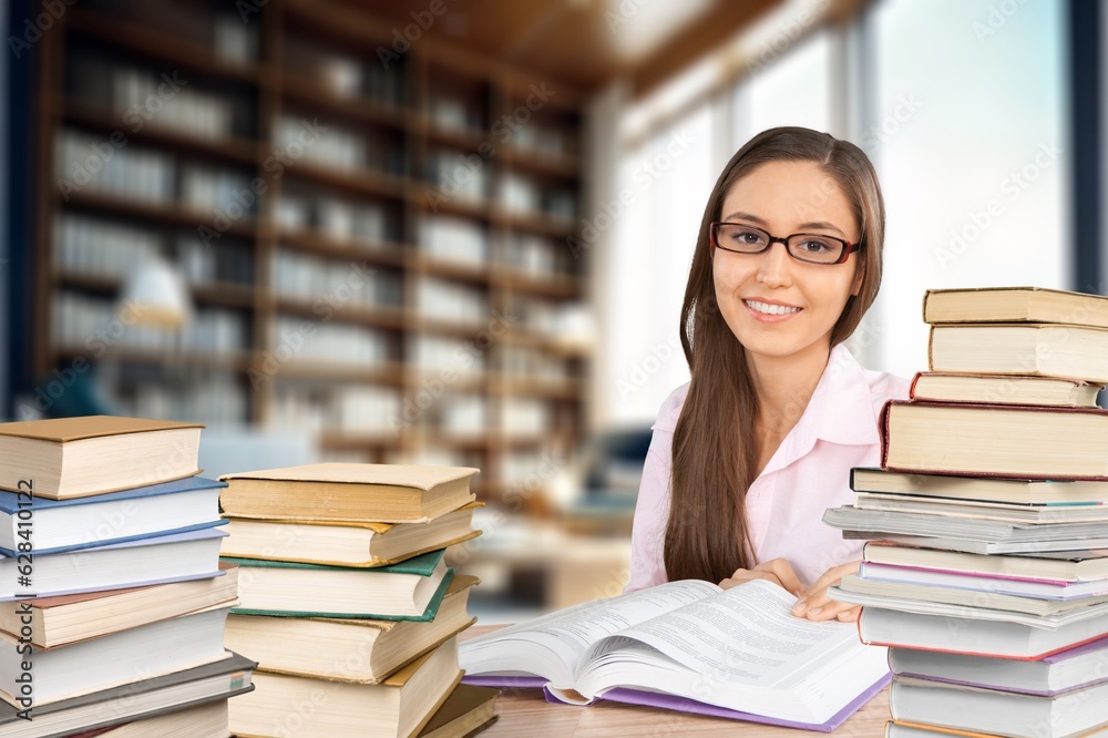 Student study at the library with a lot of books, AI generated image Student study at the library with a lot of books, AI generated image