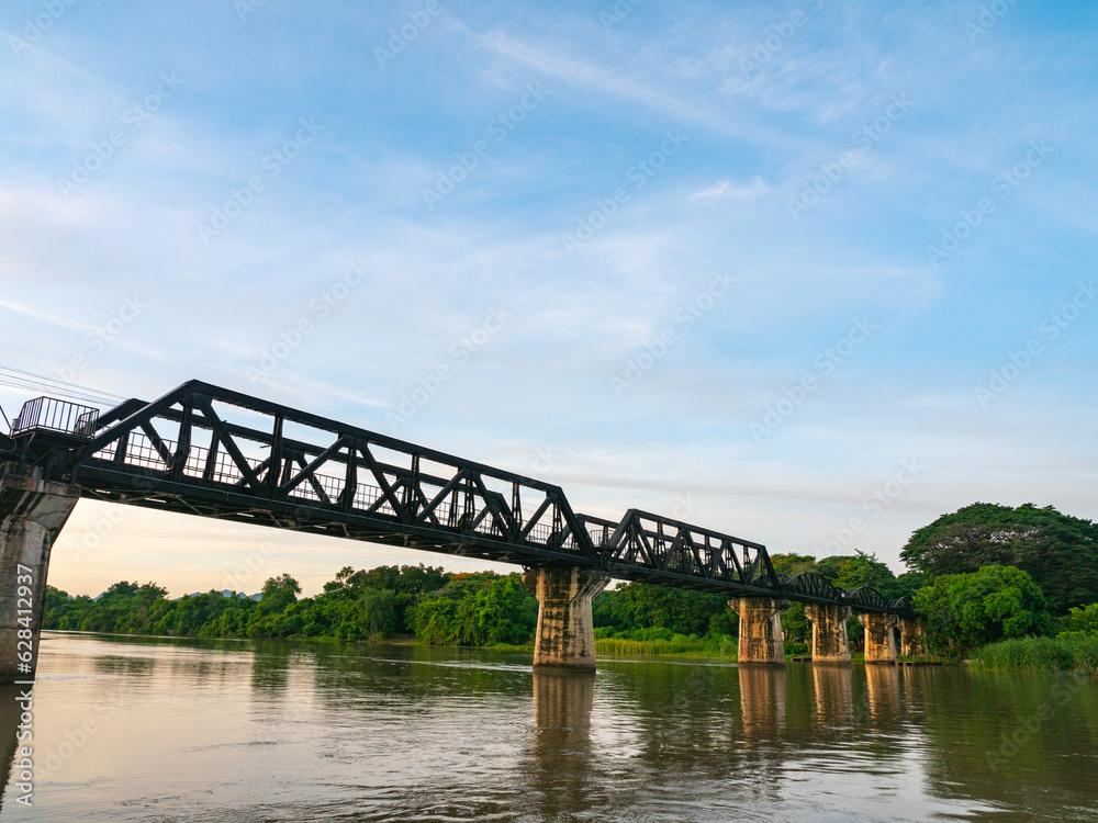 .The train is passing through the Death Railway Bridge over the River Kwai in Kanchanaburi. .During World War Two Japan constructed railway from Thailand to Burma This is now know the Death Railway..