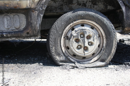 Melted car tire after fire 