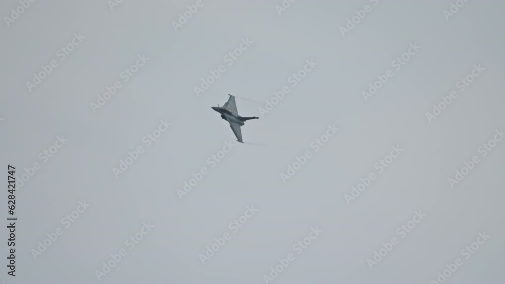 Advanced fighter jet performing high speed manoeuvres showing its abilities Advanced fighter jet performing high speed manoeuvres showing its abilities