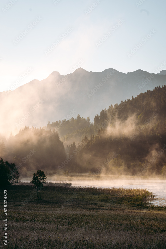 Amazing foggy Sunrise at Geroldsee, also Wagenbruchsee, Bavaria, Germany Europe