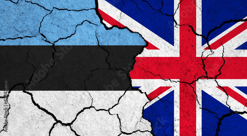 Flags of Estonia and United Kingdom on cracked surface - politics, relationship concept