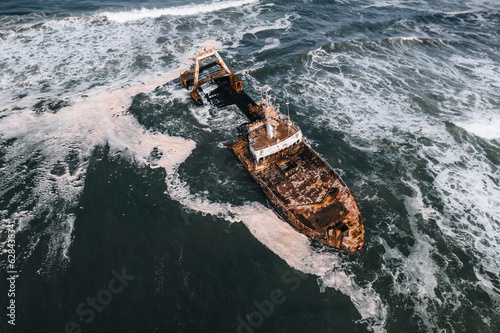 Aerial Drone View of Zeila Shipwreck in Ocean, Skeleton Coast in Namibia,Africa photo