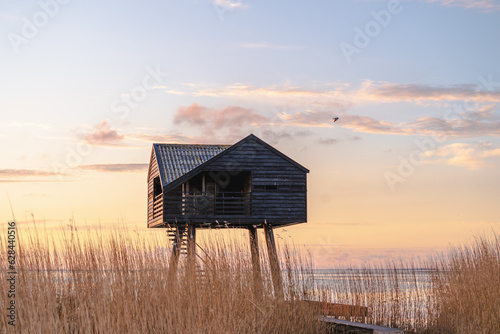 Sunset photo of Kiekkaaste Bird Observatory in The Netherlands at Wadden Sea