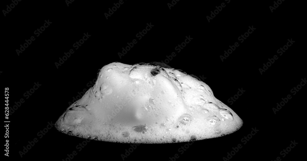 liquid white foam from soap or shampoo or shower gel Abstract soap bubbles. Set foam, soap bubble isolated on black, with clipping path texture and background.	
