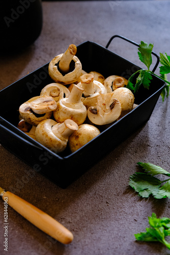 fresh champignos mushroom on the table photo