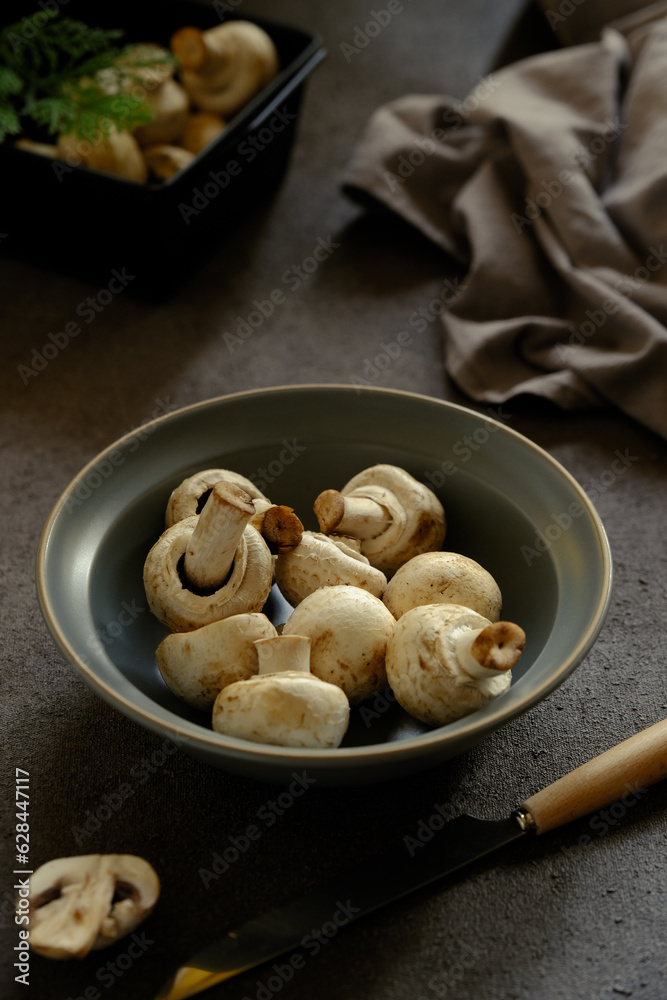 fresh champignos mushroom on the table fresh champignos mushroom on the table