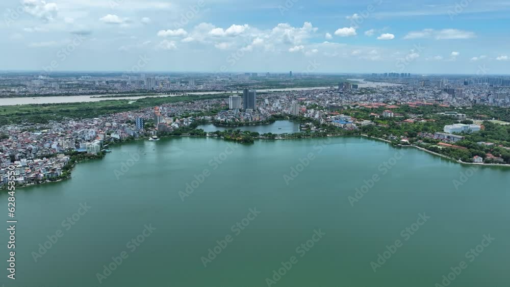 Cinematic aerial footage of the Truc Bach lake, in Hanoi, Vietnam, Asia, shot on a Mavic 3 Classic Done in 4K