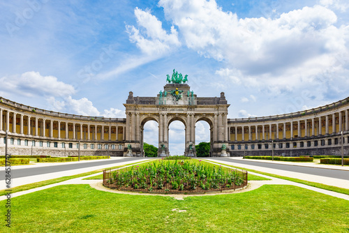 The Cinquantenaire Memorial Arcade in the centre of the Parc du Cinquantenaire, Brussels, Belgium with the text "This monument was erected in 1905 for the glorification of the independence of Belgium"