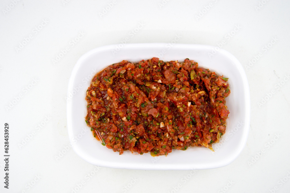 spicy turkish appetizer made with tomato, parsley and pepper spicy turkish appetizer made with tomato, parsley and pepper
