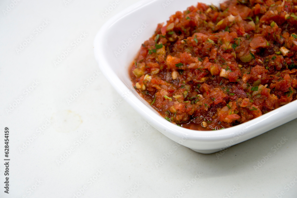 spicy turkish appetizer made with tomato, parsley and pepper spicy turkish appetizer made with tomato, parsley and pepper