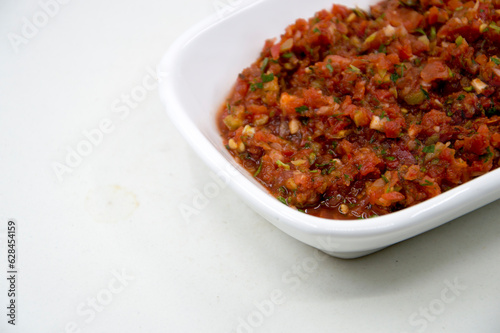 spicy turkish appetizer made with tomato, parsley and pepper