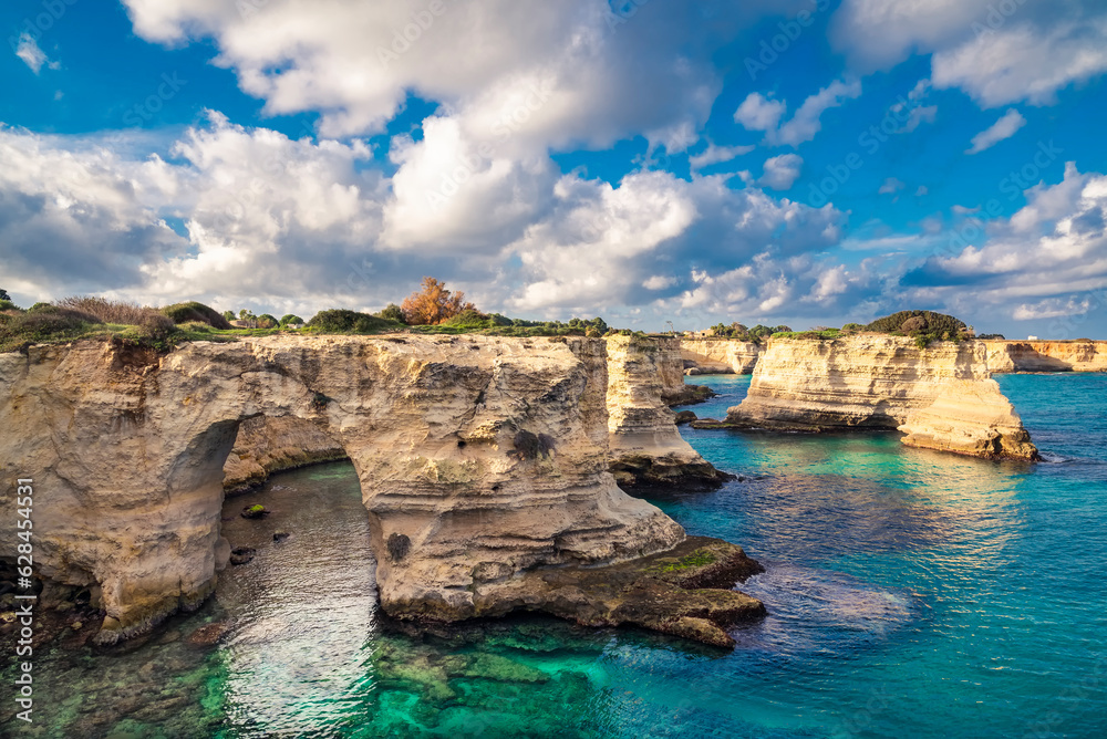 Torre Sant'Andrea - Fissures and tunnels are formed, and bridges collapse leaving lonely sentinels rising above the waves
