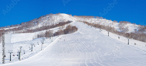 Bild auf Leinwand Quiet ski resort at early morning on a clear day (Niseko Moiwa, Hokkaido, Japan)