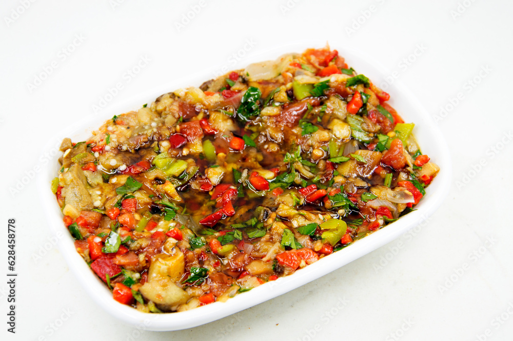 Turkish appetizer made of tomatoes, peppers, parsley and cooked eggplant