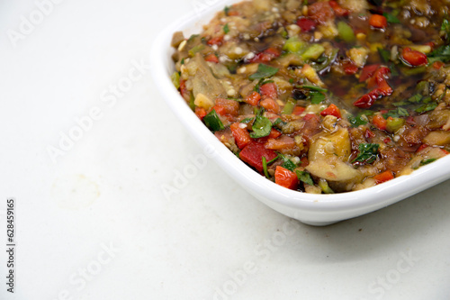 Turkish appetizer made of tomatoes, peppers, parsley and cooked eggplant