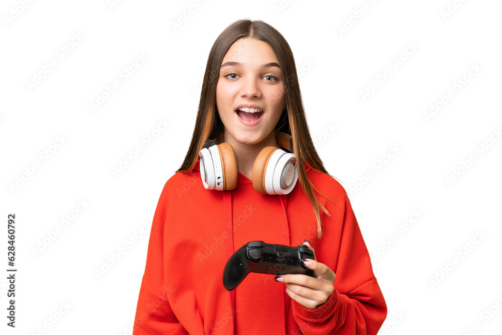 Obraz premium Teenager caucasian girl playing with a video game controller over isolated background with surprise facial expression
