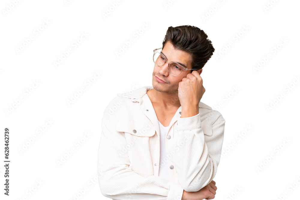 Young handsome caucasian man over isolated background with tired and bored expression Young handsome caucasian man over isolated background with tired and bored expression