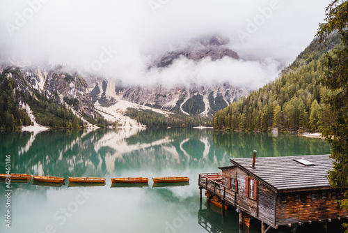 Rainy and cloudy morning at famous Lago di Braies, Pragser Wildsee, Italy