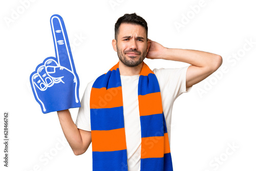 Young caucasian sports fan man over isolated chroma key background having doubts © luismolinero
