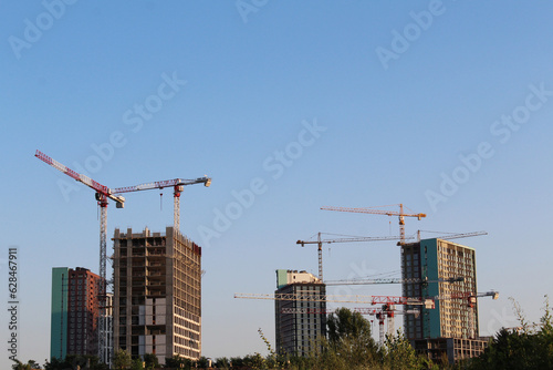 building under construction. construction site with crane. 