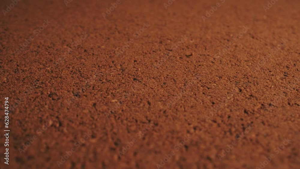 Coffee bean close-up. Roasted coffee beans spinning slow motion. Background of coffee beans. Coffee bean close-up. Roasted coffee beans spinning slow motion. Background of coffee beans.