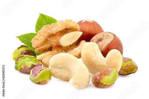 Hazelnuts, walnut and pistachios in closeup isolated on white background. Assorted nuts. Nuts with leaves.