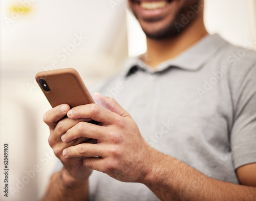 Man, hands and phone typing for social media, communication or networking at home. Closeup of male person texting or chatting on mobile smartphone app for online browsing, streaming or entertainment