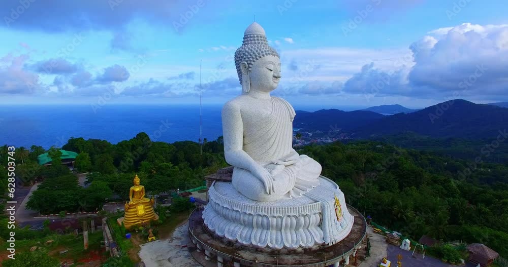 .aerial view around Phuket big Buddha in blue sky background..Phuket white big Buddha is the famous landmark in Phuket. .Aerial panoramic view landscape Phuket big Buddha on hilltop. .aerial view around Phuket big Buddha in blue sky background..Phuket white big Buddha is the famous landmark in Phuket. .Aerial panoramic view landscape Phuket big Buddha on hilltop.
