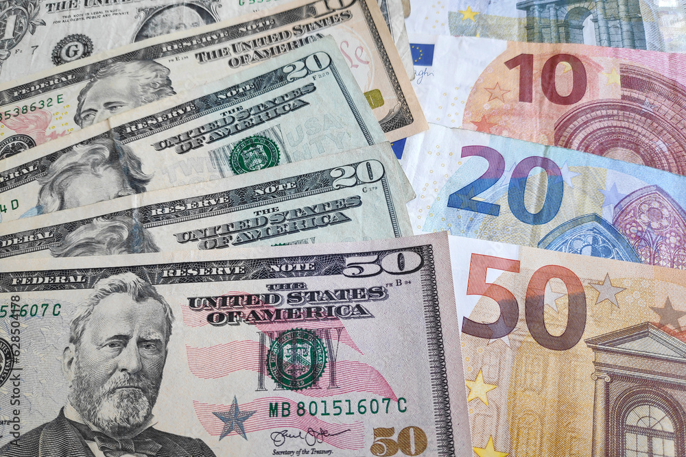 Obraz premium Stack of US Dollar and Euros