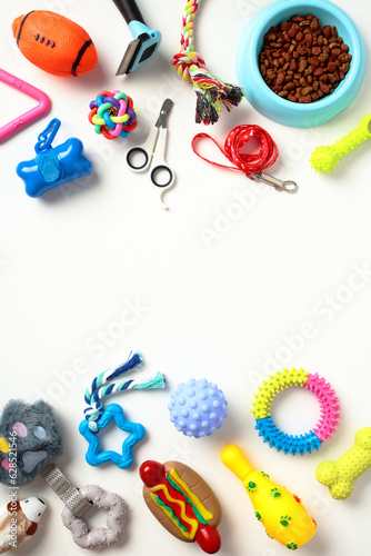 Frame of pet supplies and toys isolated on white background. Vertical banner design for pet shop.