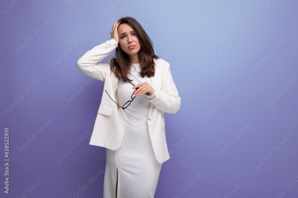 distressed tired young woman in white dress and glasses feels bad distressed tired young woman in white dress and glasses feels bad