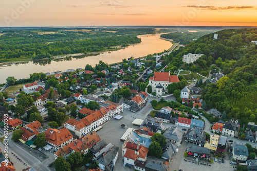 View from the drone in the morning on Kazimierz Dolny. Market square, church and castle ruins. photo