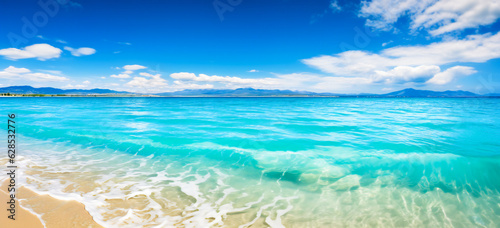 A tropical ocean scene with sand, sun with blue sky. Paradise island concept.