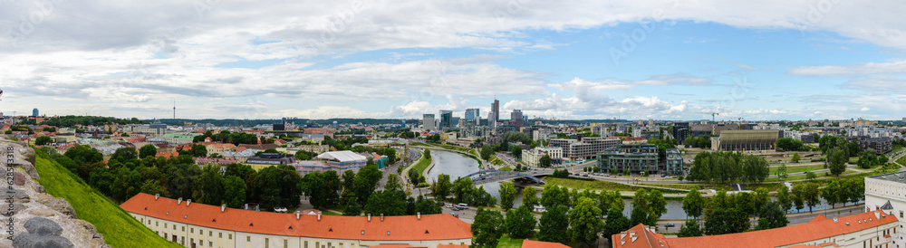 Beautiful panoramic view from top of the hill of Gediminas' Tower on Neris river and old Vilnius center, Vilnius Lithuania. Panorama of Vilnius city.