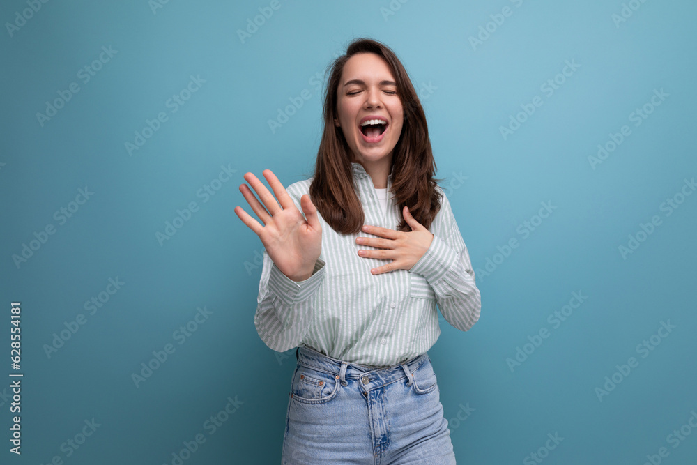 pretty young brunette woman in shirt on studio background pretty young brunette woman in shirt on studio background