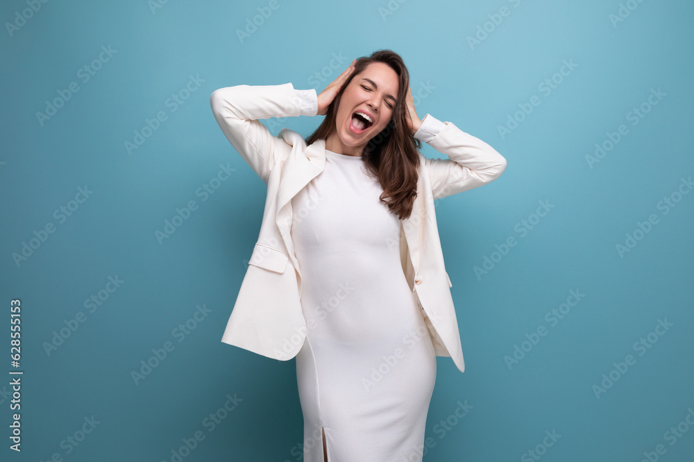 positive young lady with dark hair below her shoulders in a white dress positive young lady with dark hair below her shoulders in a white dress