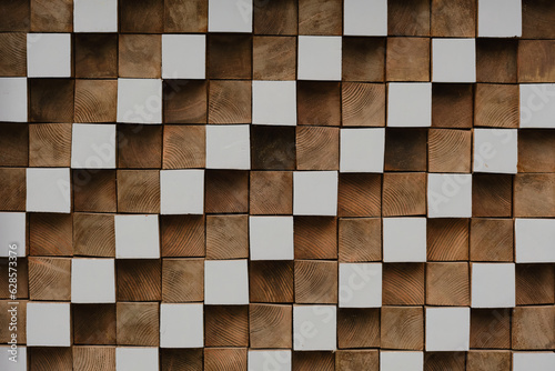 Texture of wooden cubes in natural color and painted white. © Oleg Kozlovskiy
