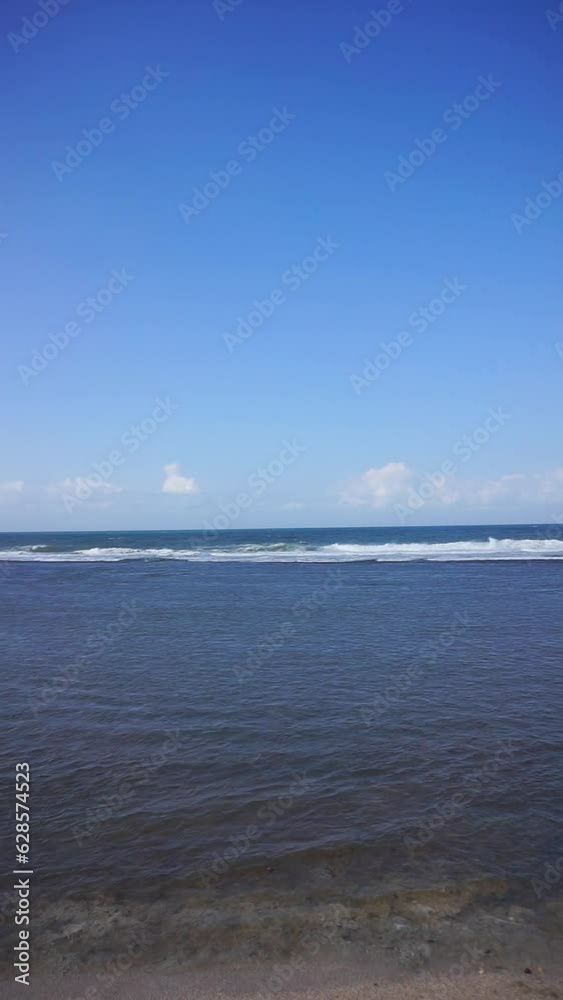 video of beautiful vertical views of the sea with small waves, beautiful natural panoramas during the day at Sayang Heulang beach, South Garut video of beautiful vertical views of the sea with small waves, beautiful natural panoramas during the day at Sayang Heulang beach, South Garut