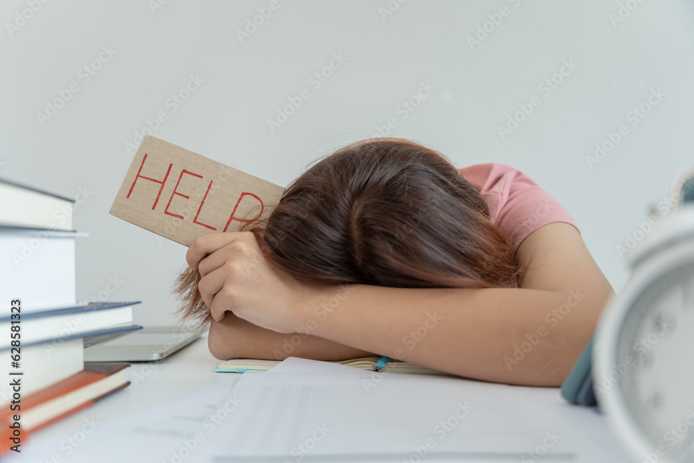 Asian student woman have anxiety because of exams, female prepare for test and learning lessons in the library. stress, despair, haste, misunderstanding reading, discouraged, expectation, knowledge Asian student woman have anxiety because of exams, female prepare for test and learning lessons in the library. stress, despair, haste, misunderstanding reading, discouraged, expectation, knowledge