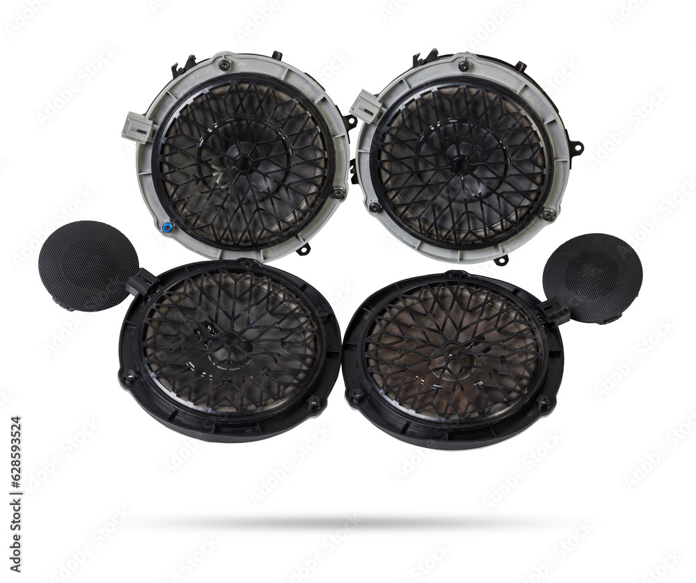 Six speakers of an acoustic system - an audio for playing music in a car interior on a white isolated background in a photo studio. Spare parts for auto repair in a workshop or for sale for tuning Six speakers of an acoustic system - an audio for playing music in a car interior on a white isolated background in a photo studio. Spare parts for auto repair in a workshop or for sale for tuning