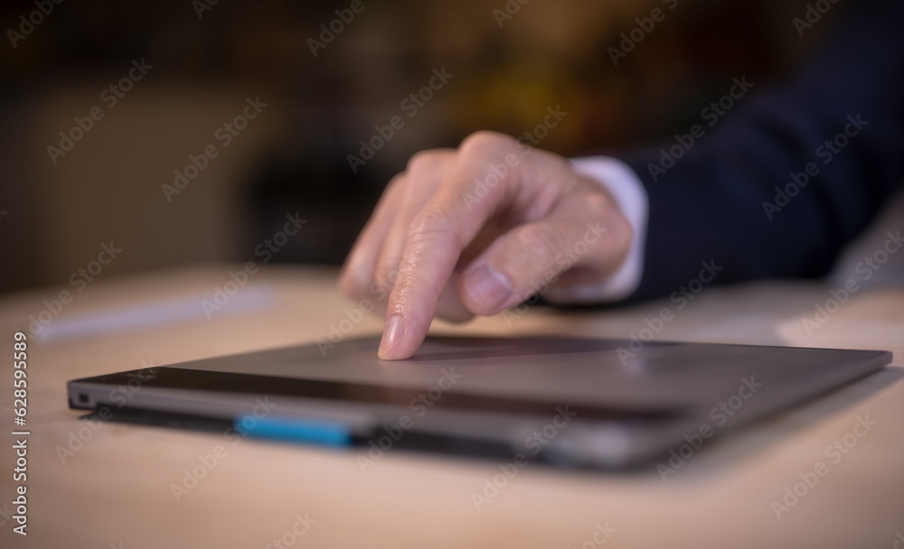 business and technology concept, businessman hand using touch pad working in office business and technology concept, businessman hand using touch pad working in office