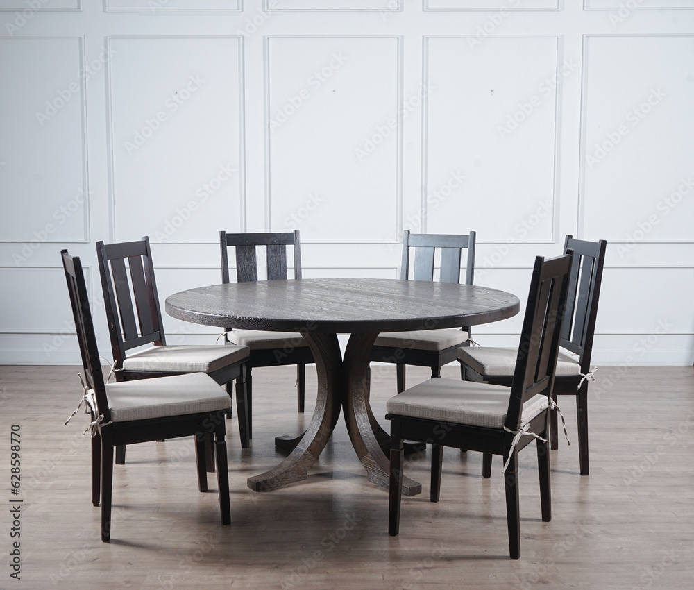 Obraz premium wood round table and chairs set on wood floor in white wall room