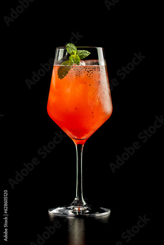 alcoholic cocktails with liquor on black background